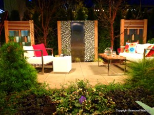 outdoor space with wall fountain and contemporary furniture