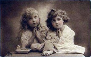 vintage cards from early 1920s, two girls praying. Summer solstice was a scary time in past.