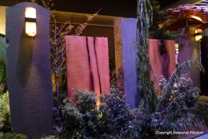 Giant slabs of purple and mauve rocks make privacy wall at 2013 northwest flower and garden show