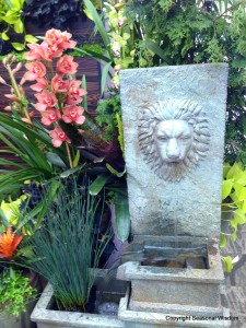 lion fountain with orchids