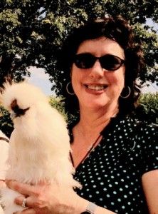 Teresa O'Connor holds a Silkie hen in P. Allen smith's garden.