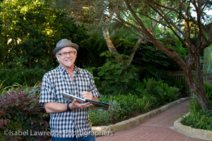 Billy Goodnick signs a copy of Yards for Seasonal Wisdom giveaway.