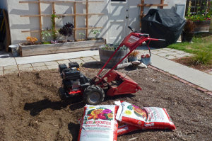 Troy-Bilt Bronco Axis Rototiller and soil booster