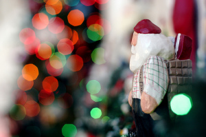 Santa by fireplace - kevin dooley flickr