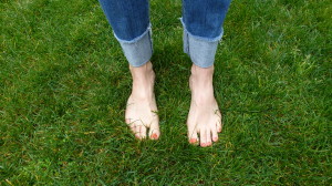 Feet in grass from The Cancer Survivor's Garden Companion