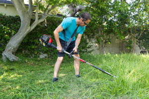 man with brush cutter