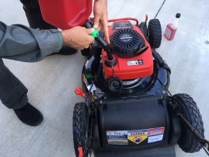 adding gas to a troy bilt lawn mower