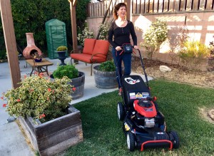 woman and troy bilt lawn mower